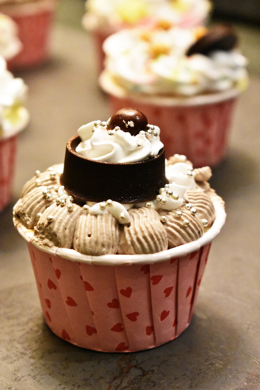 Decorated cupcake with swirled frosting and chocolate garnish
